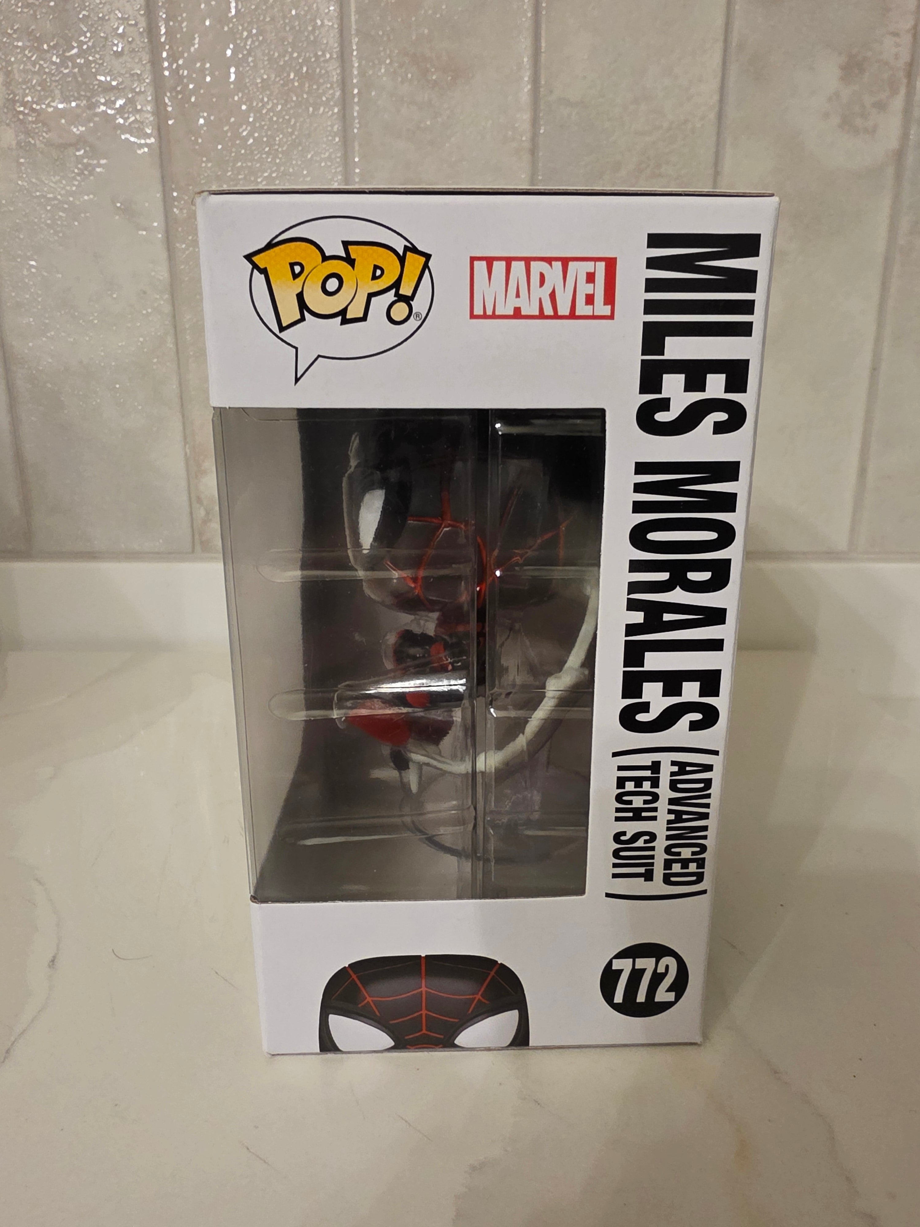 Funko Pop! Marvel Miles Morales (advanced tech suit) 772 (pre-owned)